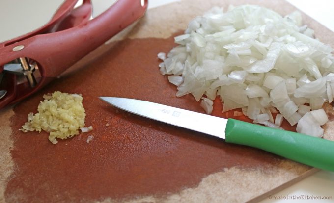 Chopped onions and garlic for White Chicken Chili